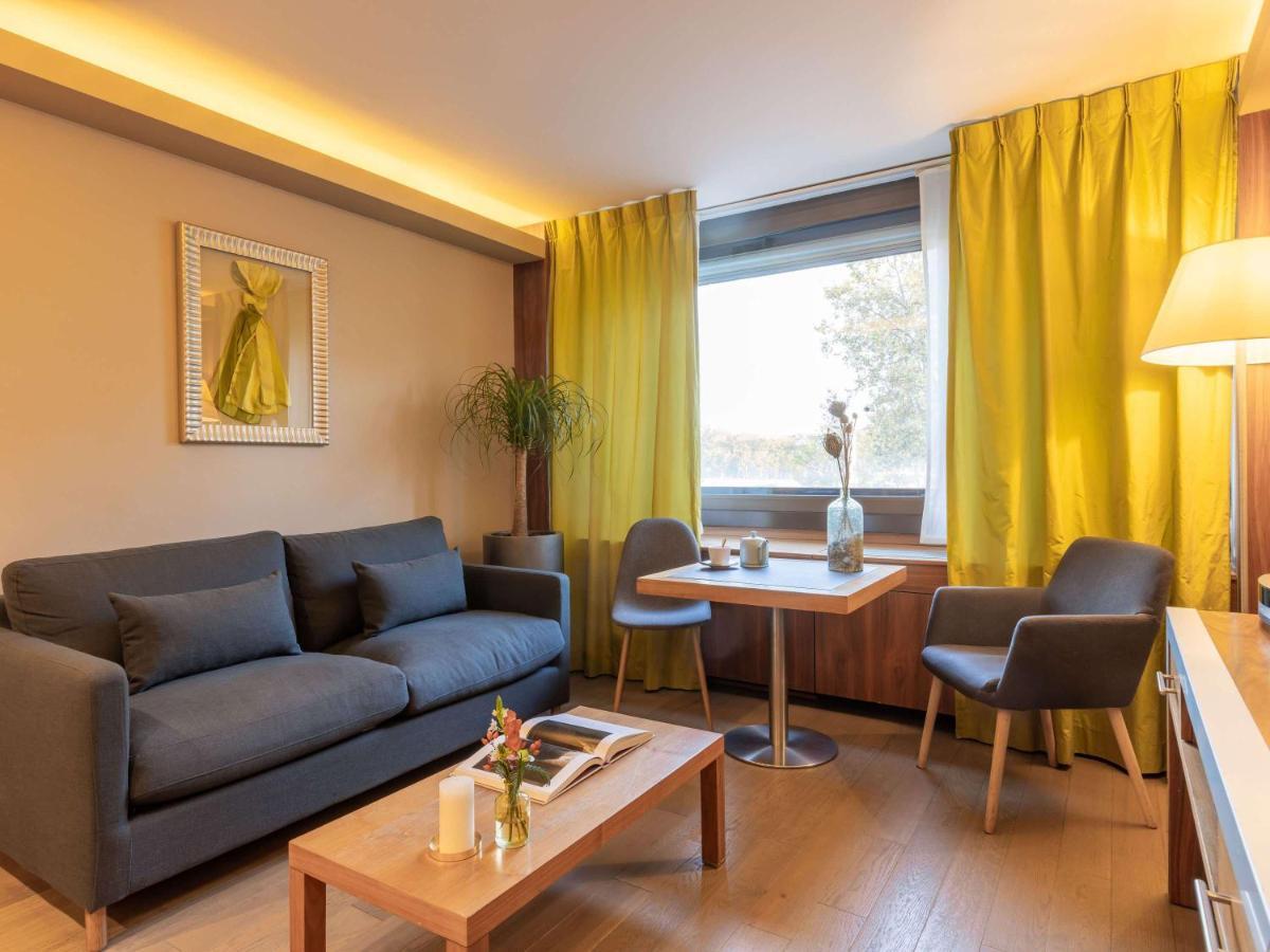 소피텔 리옹 벨쿠르 호텔 외부 사진 A typical apartment at the residence
