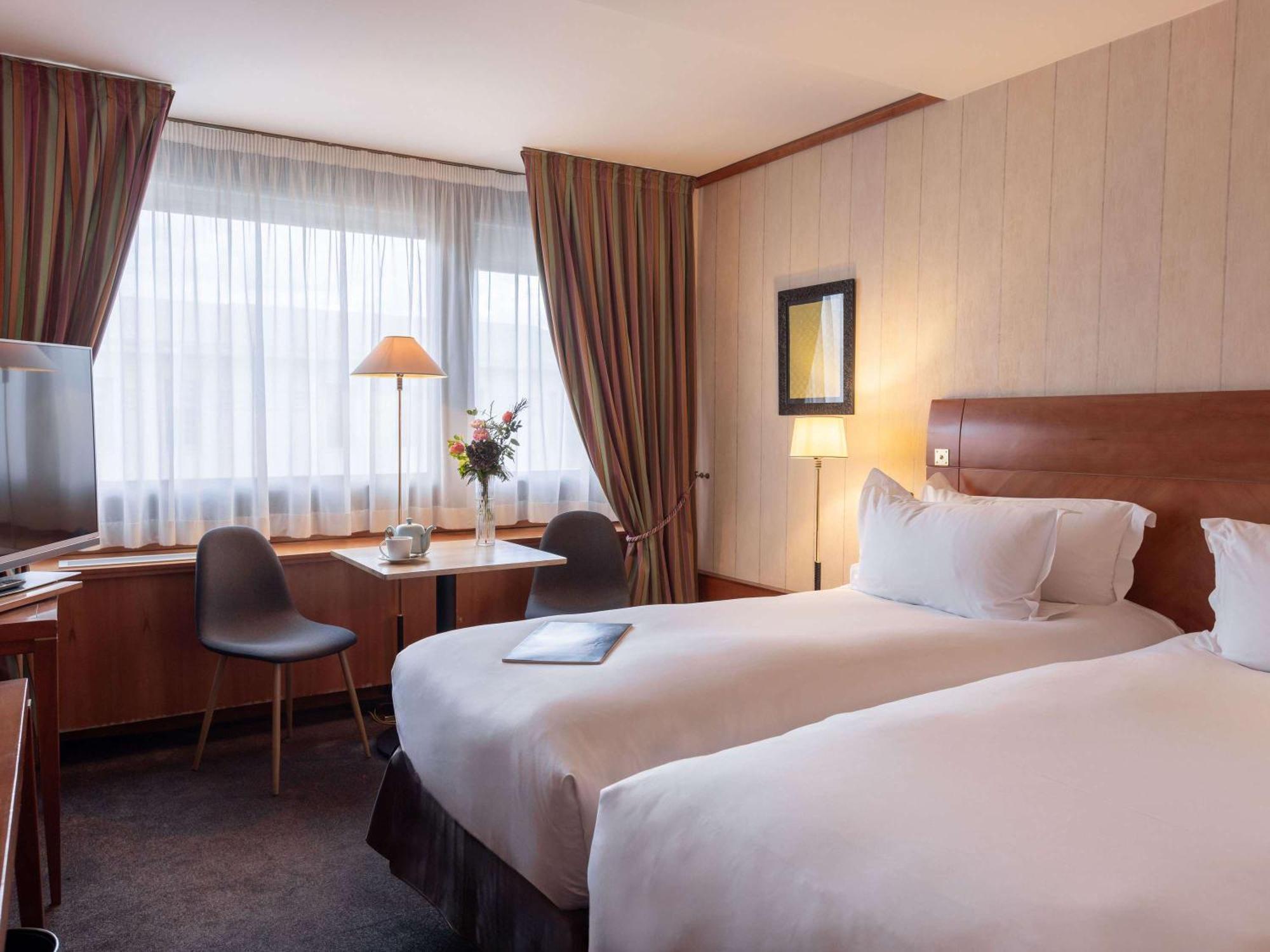 소피텔 리옹 벨쿠르 호텔 외부 사진 A typical room at the hotel